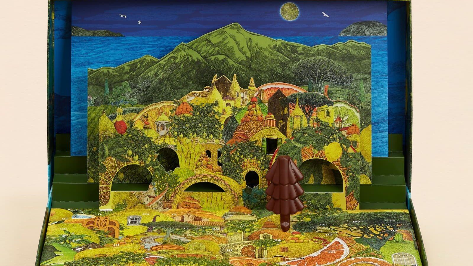 Le calendrier de l’Avent Alain Ducasse ouvert, un village provençal en relief avec un sapin en chocolat