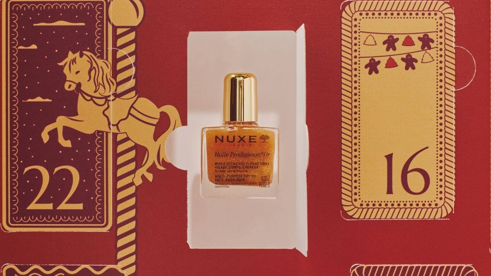 Une case ouverte du calendrier Monoprix Pépites Beauté laisse voir une Huile Prodigieuse Nuxe